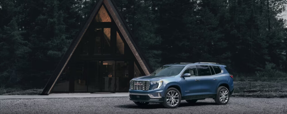 2024 GMC Acadia in the woods